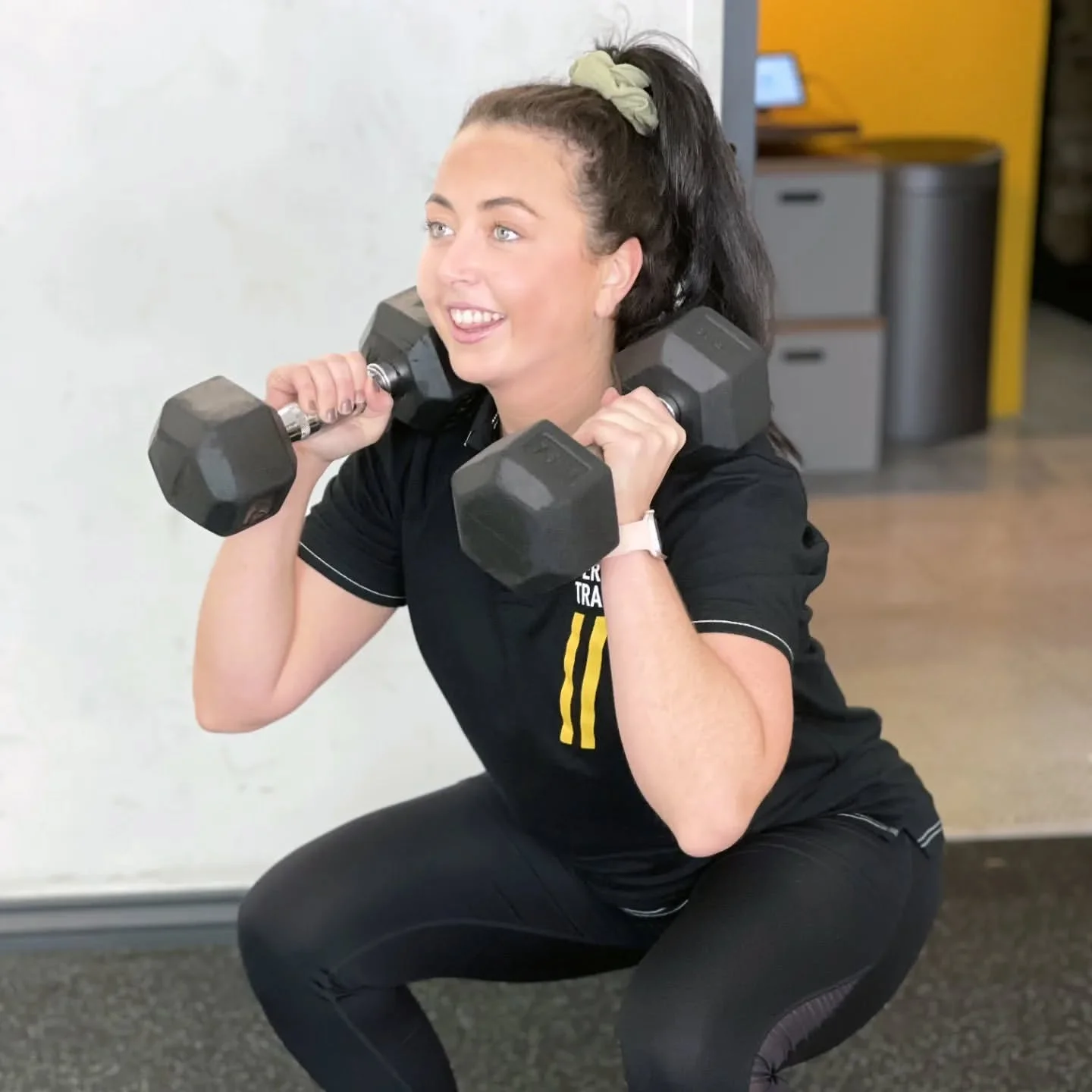 Lauren doing squat press