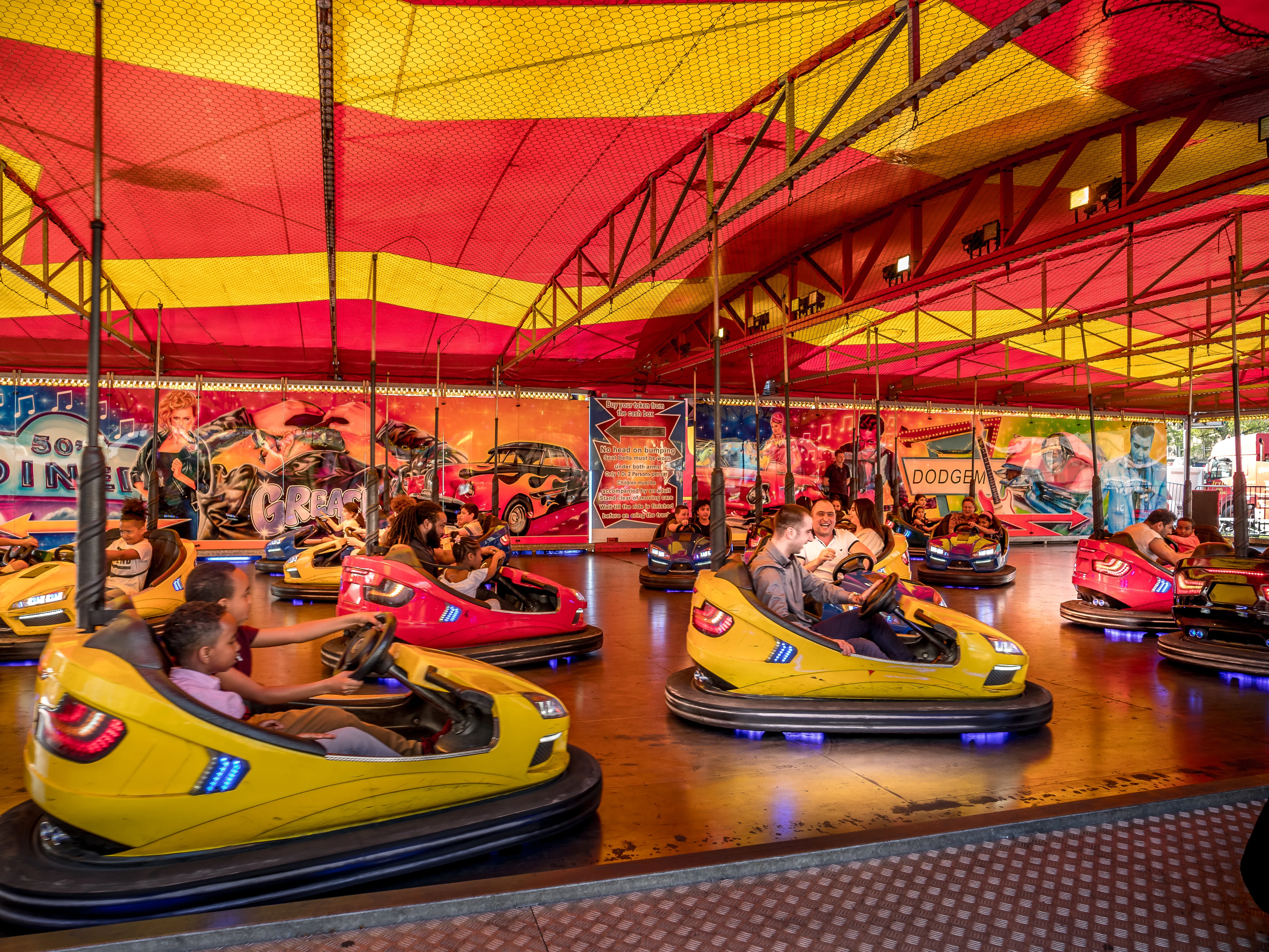 Dodgems bumper cars under colorful tent