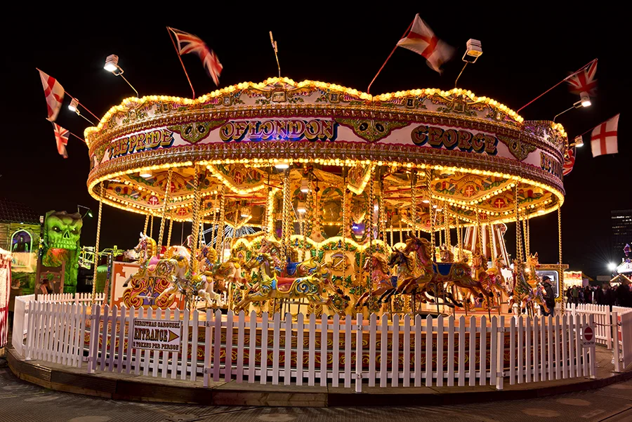 London Ghost Train carousel illuminated at night